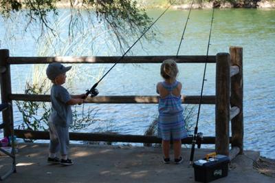 Kids Fishing From a Dock, Second Place in Fishing Photo Story Contest