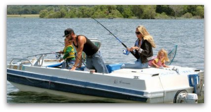 family fishing on a boat, beginners catching fish, freshwater fishing family fishing on a boat, beginners catching fish, freshwater fishing