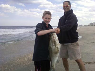 Ben and Uncle Joe with a New Jersey Striped Bass