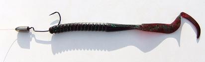 texas rig, pushing head of worm through hook