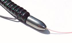 Toothpick pegged into weedless style Texas fishing rig. Toothpick pegged into weedless style Texas fishing rig.