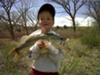 Little boy with his big largemouth bass.