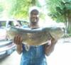 Can't help but smile for catching this big catfish!